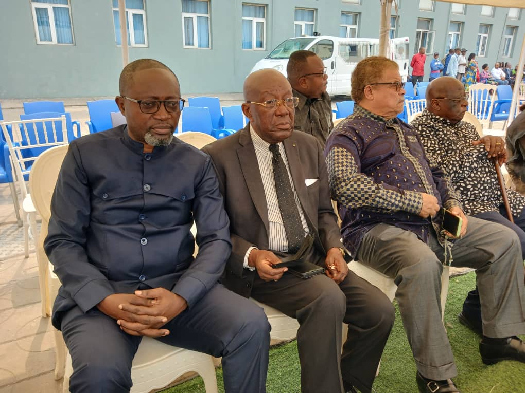 Dr. Justin B. Mudekereza seated with community leaders