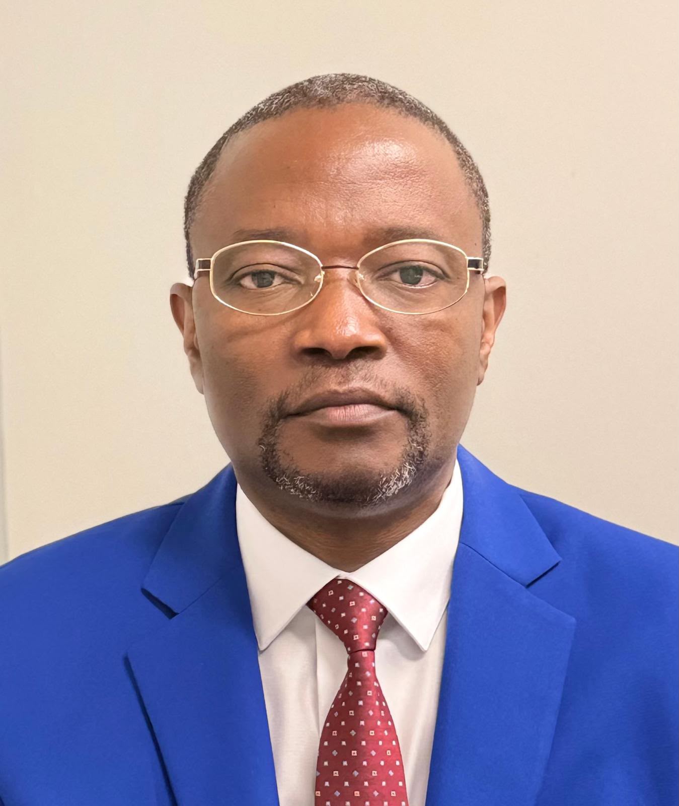 Official portrait of Dr. Justin B. Mudekereza